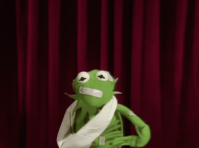 Kermit The Frog With Arm Bandage And Red Curtain GIF