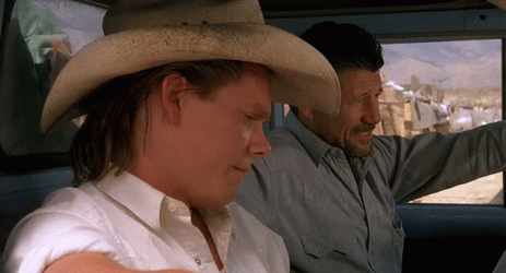 Kevin Bacon And Fred Ward Intense Gaze GIF