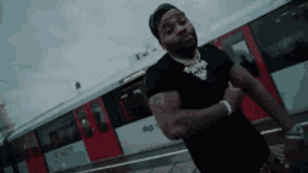 Kevin Gates On Railway Flexing Muscles GIF