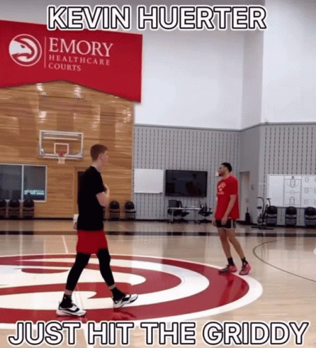 Kevin Huerter Just Hit The Griddy Is Written Above A Basketball Court GIF