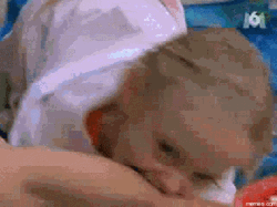 Kid Bites Boy's Leg GIF