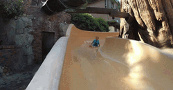 Kid Enjoying Water Park Slide GIF