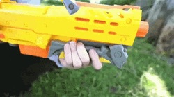 Kid Loading Toy Gun GIF