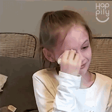 Kid Looking Happy While In Tears Of Joy GIF