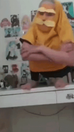 Kid Mimicking Dr. Seuss' The Lorax Or Onceler GIF