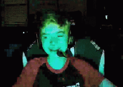 Kid On A Computer Flashing Colors GIF