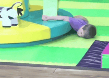 Kid Pass Out In Carousell GIF