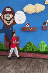 Kid Playing Super Mario GIF