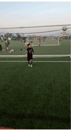 Kid Practicing Ronaldo Bicycle Kick GIF