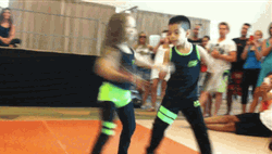 Kids Energetically Performing Salsa GIF