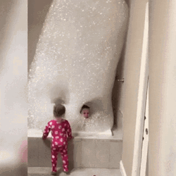 Kids In Bath Tub Huge Bubbles GIF