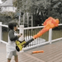 Kids Playing Flamethrower Toy GIF