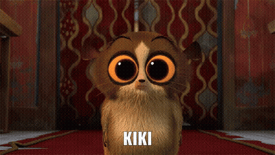 Kiki Standing On Red Carpet GIF