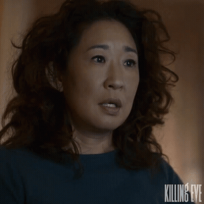 Killing Eye Text On Woman's Face GIF