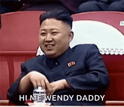 Kim Jong Un Sitting In Stadium With Water GIF