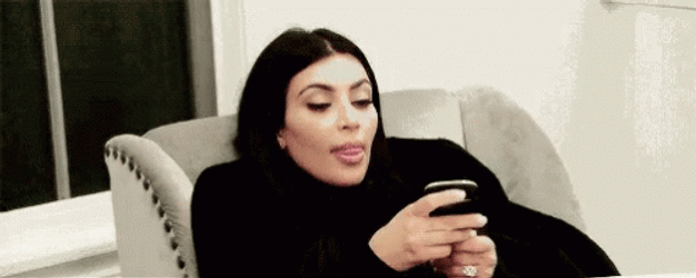 Kim Kardashian Ignoring Phone Chat GIF