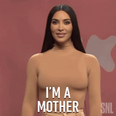 Kim Kardashian Says I 'M A Mother In Front Of A Pink Background GIF