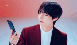 Kim Taehyung Holding LG Phone GIF