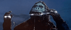 King Kong Biting On Power Lines Old Movie GIF