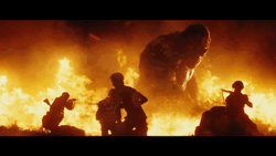 King Kong Fighting Soldiers On Burning Flames GIF