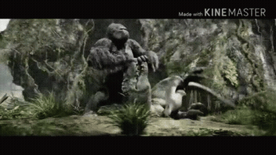 King Kong Is Eating A Dinosaur In The Jungle In A Movie . GIF