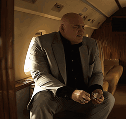 Kingpin Getting Out His Seat GIF