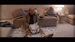 Kingpin Woody Harrelson Tossing Money GIF