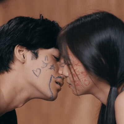 Kissing Man And Woman With Hearts And Stars GIF