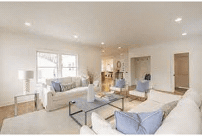 Kitchen With Stainless Steel Appliances And Blue Cabinets GIF