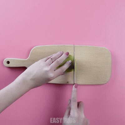Kiwi Sliced On Cutting Board With Easy Plus GIF