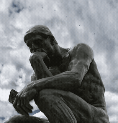 Kneeling Man Statue Hands On Chin GIF