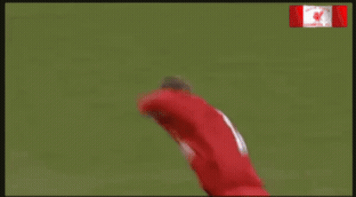 Kneeling Man With White Tank And Red Shorts GIF