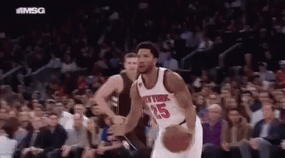Knicks Player Dribbling Basketball In Front Of Crowd GIF