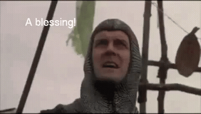 Knight In Helmet Saying Blessing GIF