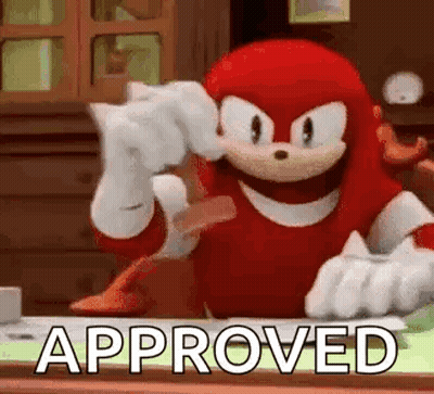 Knuckles The Echidna Sitting At Desk Holding Paper GIF