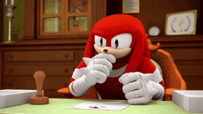 Knuckles The Echidna Sitting At Desk Holding Paper GIF