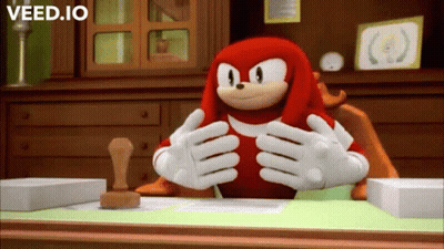 Knuckles The Echidna Sitting At Desk GIF