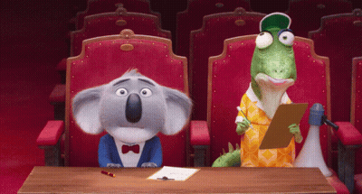 Koala And Lizard At Table With Clipboard GIF