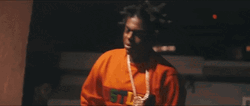 Kodak Black On Orange Shirt Dancing GIF