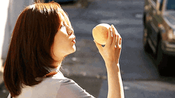 Korean Park So-Dam Adoring Her Peach GIF