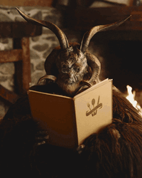 Krampus Reading A Book GIF