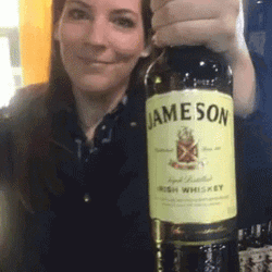 Kristen Jameson Holding Jameson Whiskey Bottle GIF