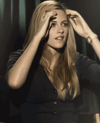 Kristen Stewart Fixed Hair While Seating GIF