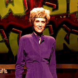 Kristen Wiig Awkward Smile While Dancing GIF