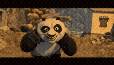 Kung Fu Panda Smiling In Front Of Building GIF