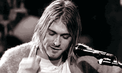Kurt Cobain Pulling Hair Behind Ear GIF