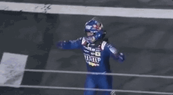 Kyle Busch Doing Fist Pump While Running GIF