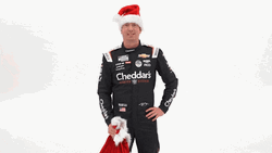 Kyle Busch Lifting Santa Bag Onto His Shoulder GIF