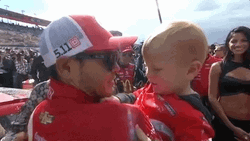 Kyle Larson Kissing His Son GIF