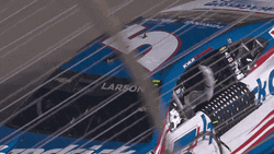 Kyle Larson Waving From Hist Car GIF